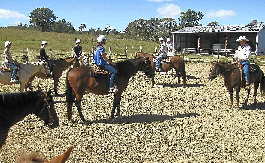 BEST HOOF FORWARD: Peter and Gill Gould issue instructions to the mostly novice adult riders. BEST HOOF FORWARD: Peter and Gill Gould issue instructions to the mostly novice adult riders.